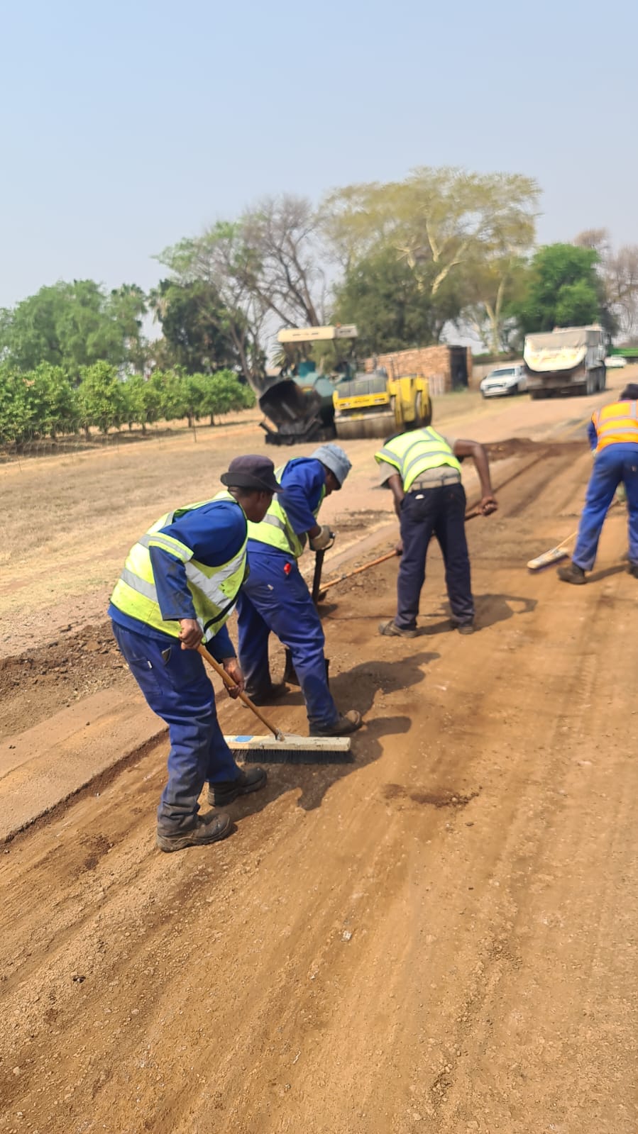 ProMactar crew preparing a road base